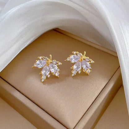 Alba Montiel™ | Pendientes de la suerte con hojas blancas y collar gratis