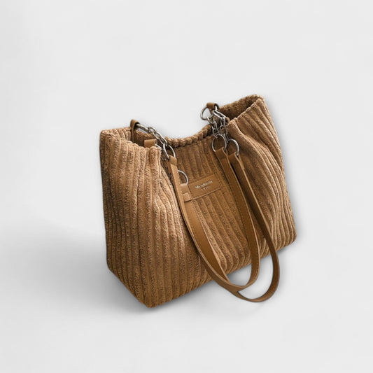 Aurora – Delicada bolsa de hombro de pana con un aire elegante
